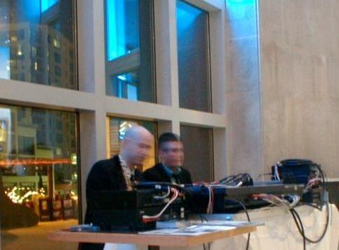 Chris and Alex mixing beneath aqueous light at the Seattle Art Museum; photo by Jennifer Keller.